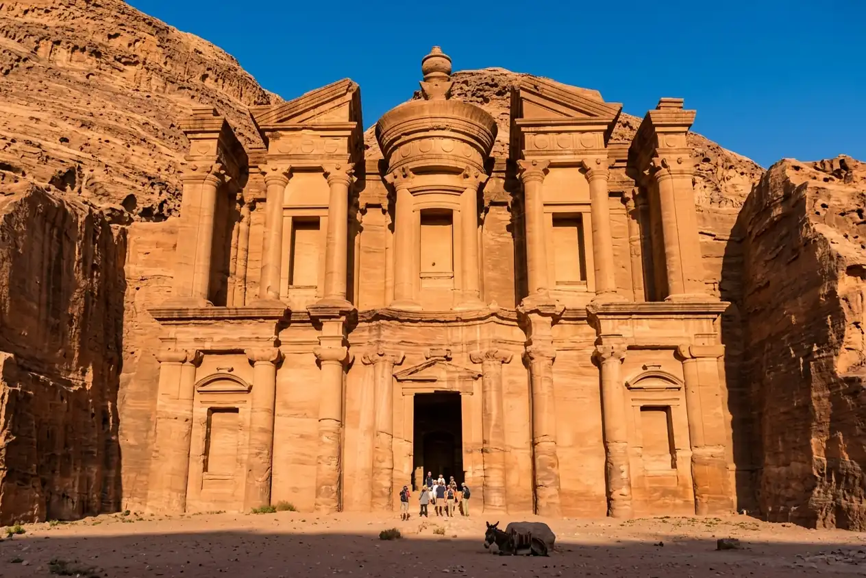 The rock-cut facade of Ad Deir, the Monastery at Petra, in late afternoon sun
