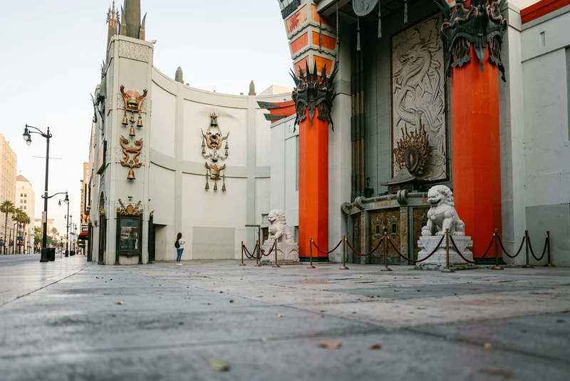 Red columns, stone lions and the carved dragon at the Chinese Theatre entrance in Hollywood