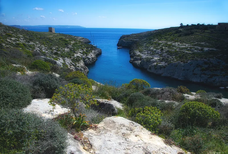 The narrow inlet of Mġarr ix-Xini on Gozo, with its watchtower at the mouth