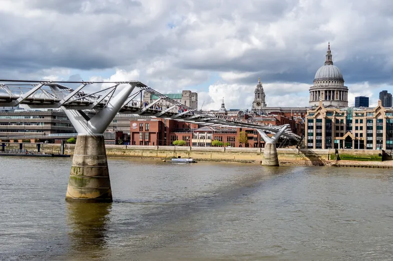 The Millennium Bridge over the Thames with St Paul's Cathedral behind