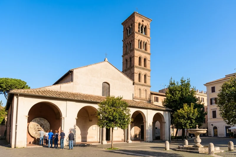Visitors waiting in the portico of Santa Maria in Cosmedin, Rome, at the Mouth of Truth
