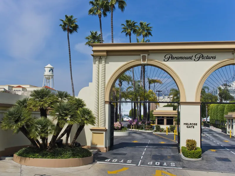 Paramount Pictures Melrose Gate arch with palm trees and the studio water tower